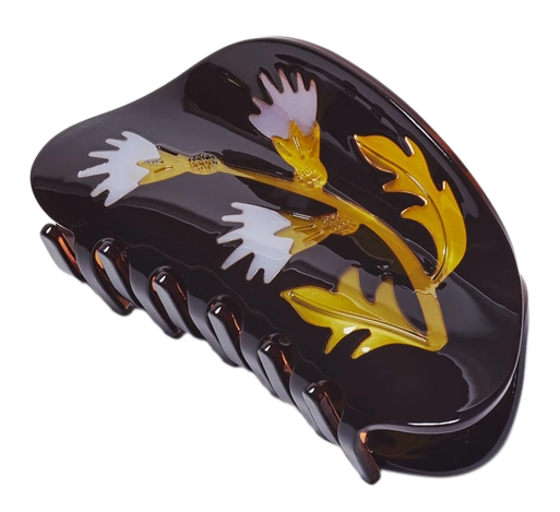 <p>Hårklemme Mariategne i mørkebrun og gull Designforevig accessories</p>
