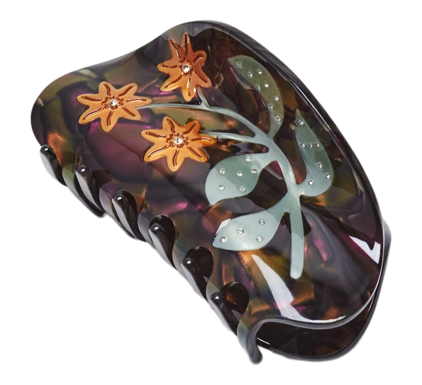 <p>Hårklemme Marikåpe i lilla og gull Designforevig accessories</p>
