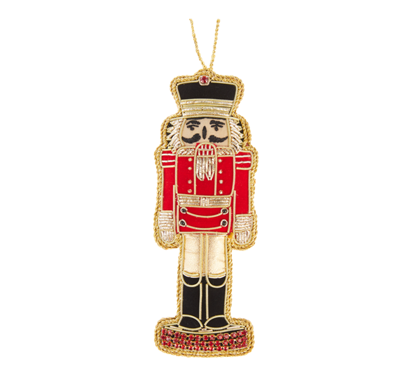 <p>Nøtteknekker med broderinger 15cm rød Tinker Tailor</p>
